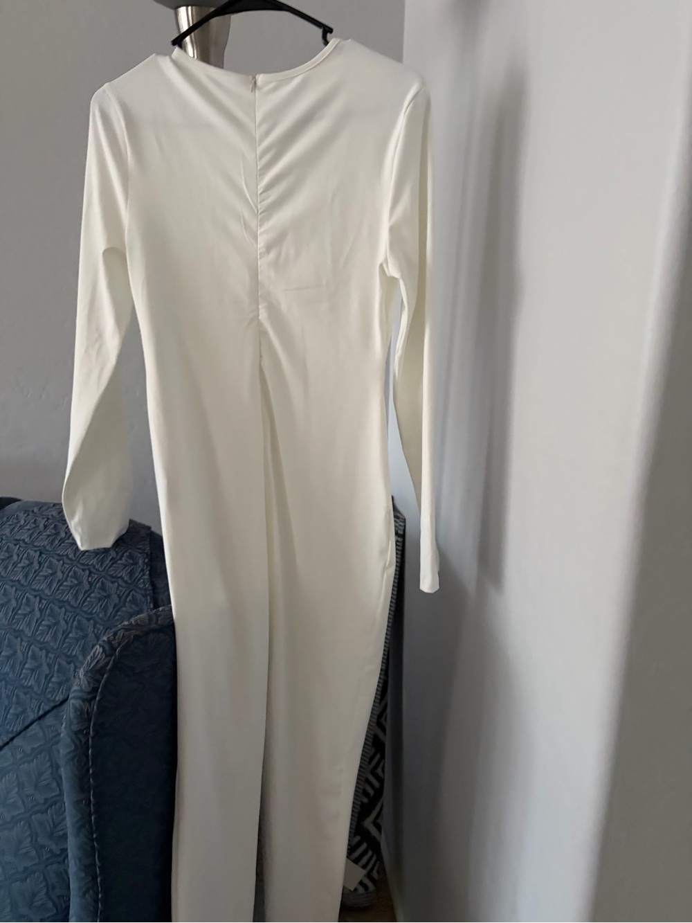 Elegant White Long-Sleeve body suit.